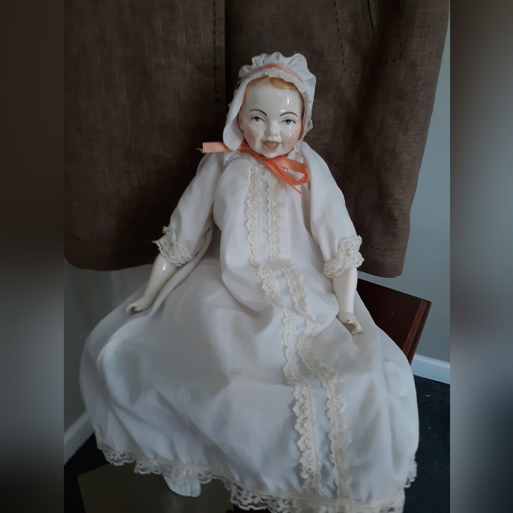 Vintage Porcelain Doll in Cream Dress